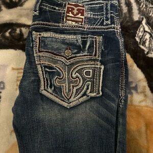 Rock Revival Distressed Blue Jeans with Embroidered Pockets